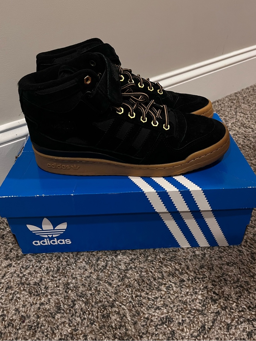 adidas Men’s Black High-Top Sneakers with Gum Outsole and Gold Eyelets